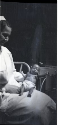 Flossie with one of her smallest patients.